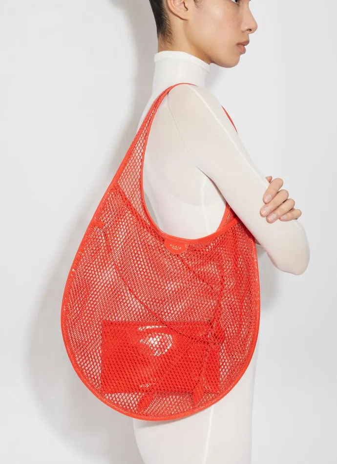 Alaa CrossBody Bags ONE PIECE MEDIUM BAG IN FISHNET Orange 8211 Women Alaa CrossBody Bags ONE PIECE MEDIUM BAG IN FISHNET Orange 8211 Women