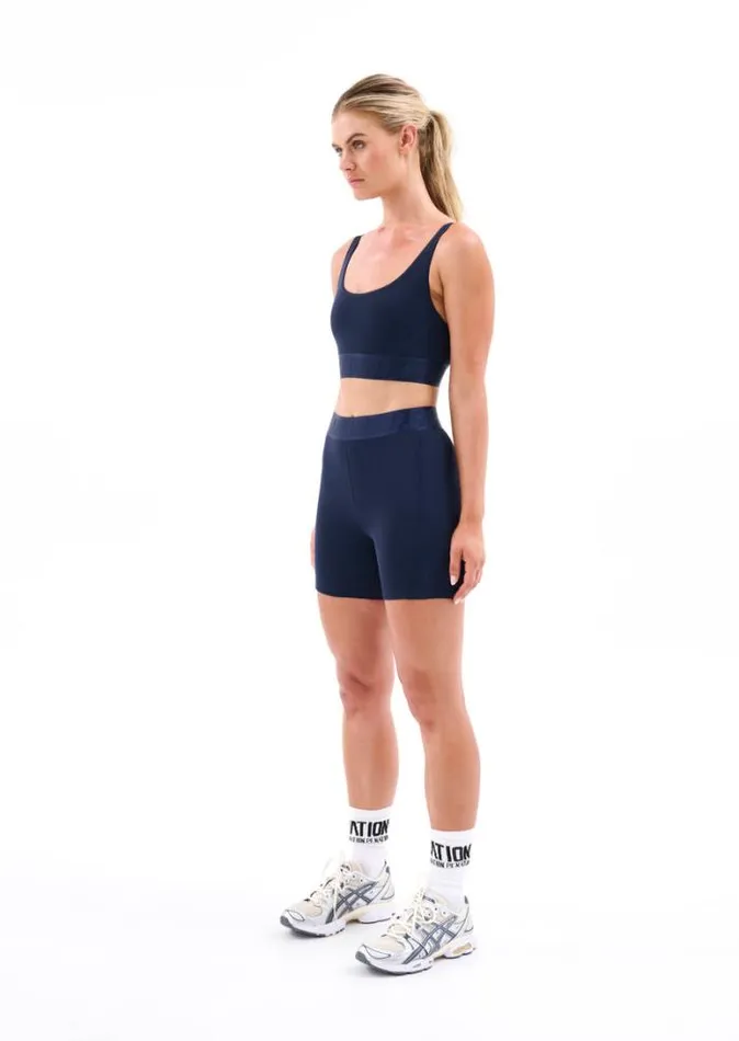 Shop BACKCHECK BIKE SHORT IN DARK NAVY PE Nation Shorts
