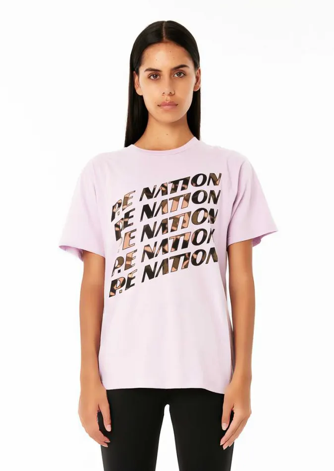 Shop BLOCK PASS SS TEE IN FAIR ORCHID PE Nation Tees and Tanks