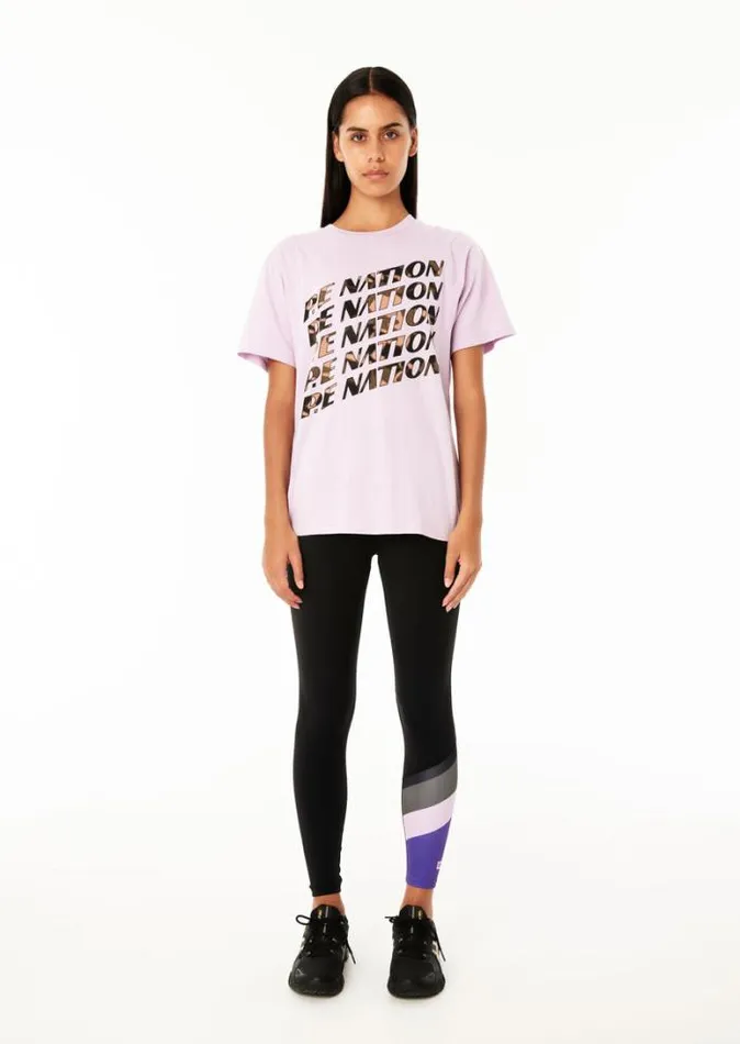 Shop BLOCK PASS SS TEE IN FAIR ORCHID PE Nation Tees and Tanks