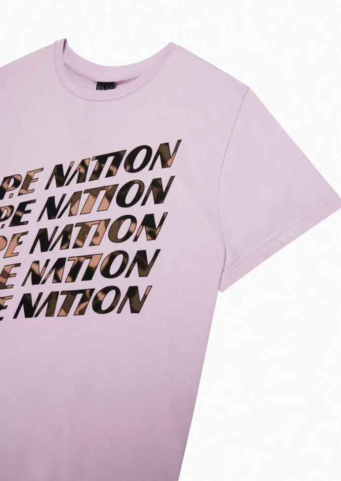 Shop BLOCK PASS SS TEE IN FAIR ORCHID PE Nation Tees and Tanks